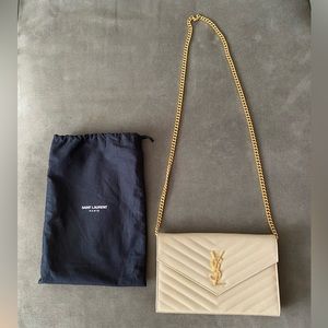 SAINT LAURENT
Monogramme quilted textured-leather shoulder bag